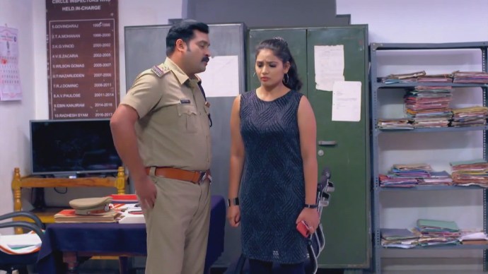 Police officer orders Nitya to leave