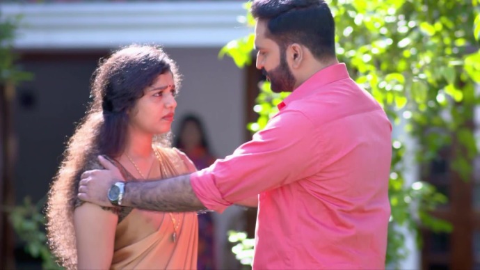 Anand talks to Kalyani while Ganga is watching (source:ZEE5)