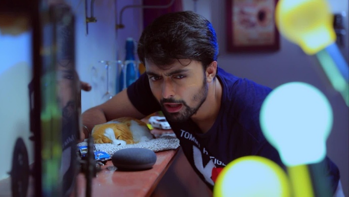 A Still Of Krishna Talking To The AI Device
