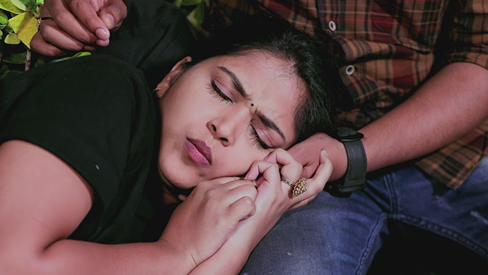 A Still Of Kamali Asking Rishi Not To Leave Her