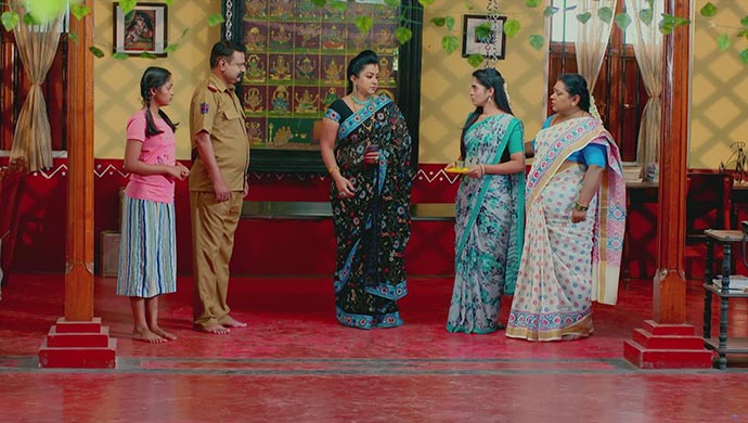 A Still Of Suhasini And The Manjunath Family