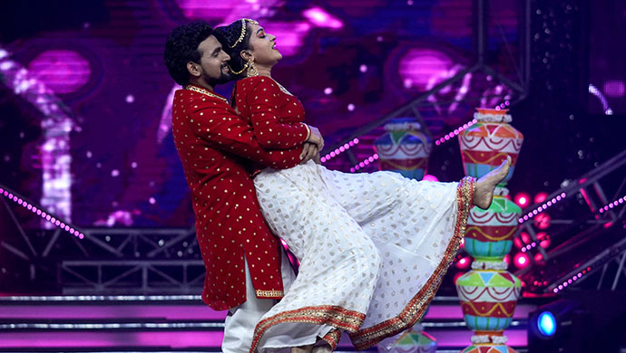 An Exclusive Still Of Ashok And Bhavani Performing On Stage