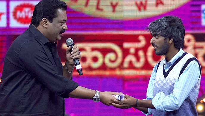 An Exclusive Still Of Hanumantha Getting A Scroll