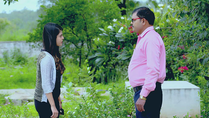 A Still Of Anushka And The Journalist
