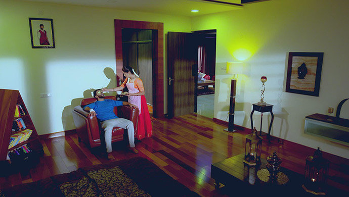 A Still Of Paaru Feeding Aditya Dinner