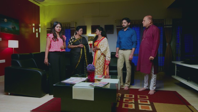 A Still Of The Ashwath Family