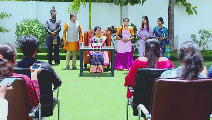 A Still Of The Press Conference That Akhila Holds