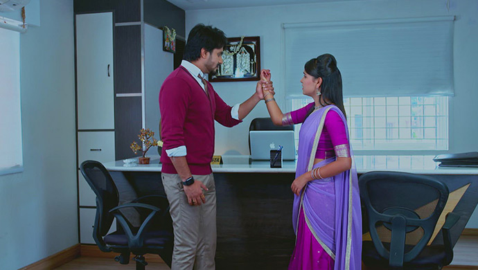 A Still Of Vedanth Holding Amulya's Hand Tightly