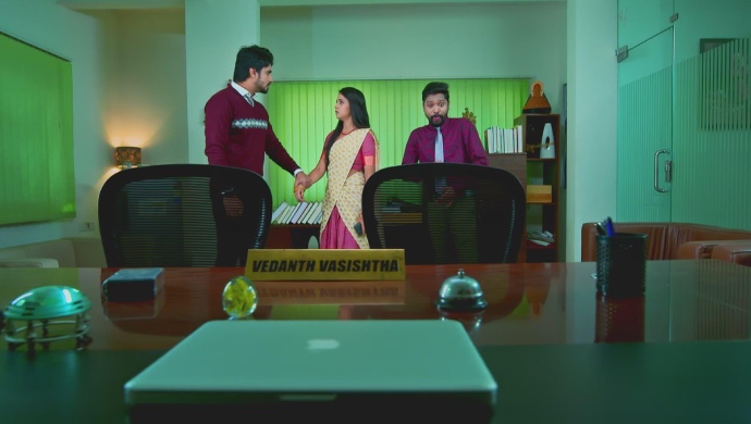 A Still Of Vedanth Holding Amulya's Hand In Kantha's Presence