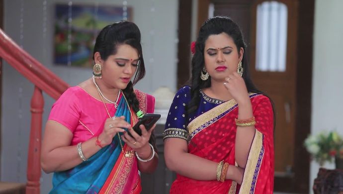 Maya's friend shows her thatthe Ajji is actually an actress