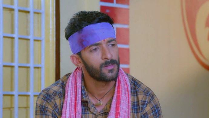 Adi tries to understand the relationship between the two families