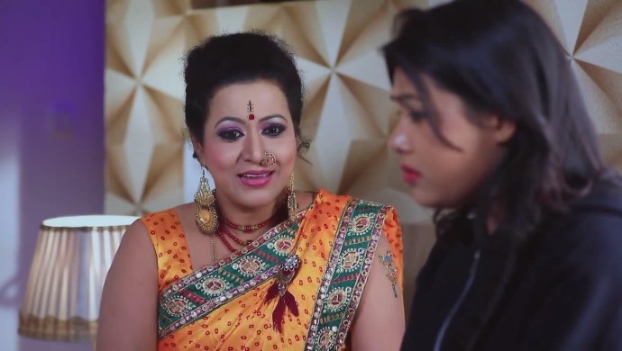 Anika and her mother talk about rose day